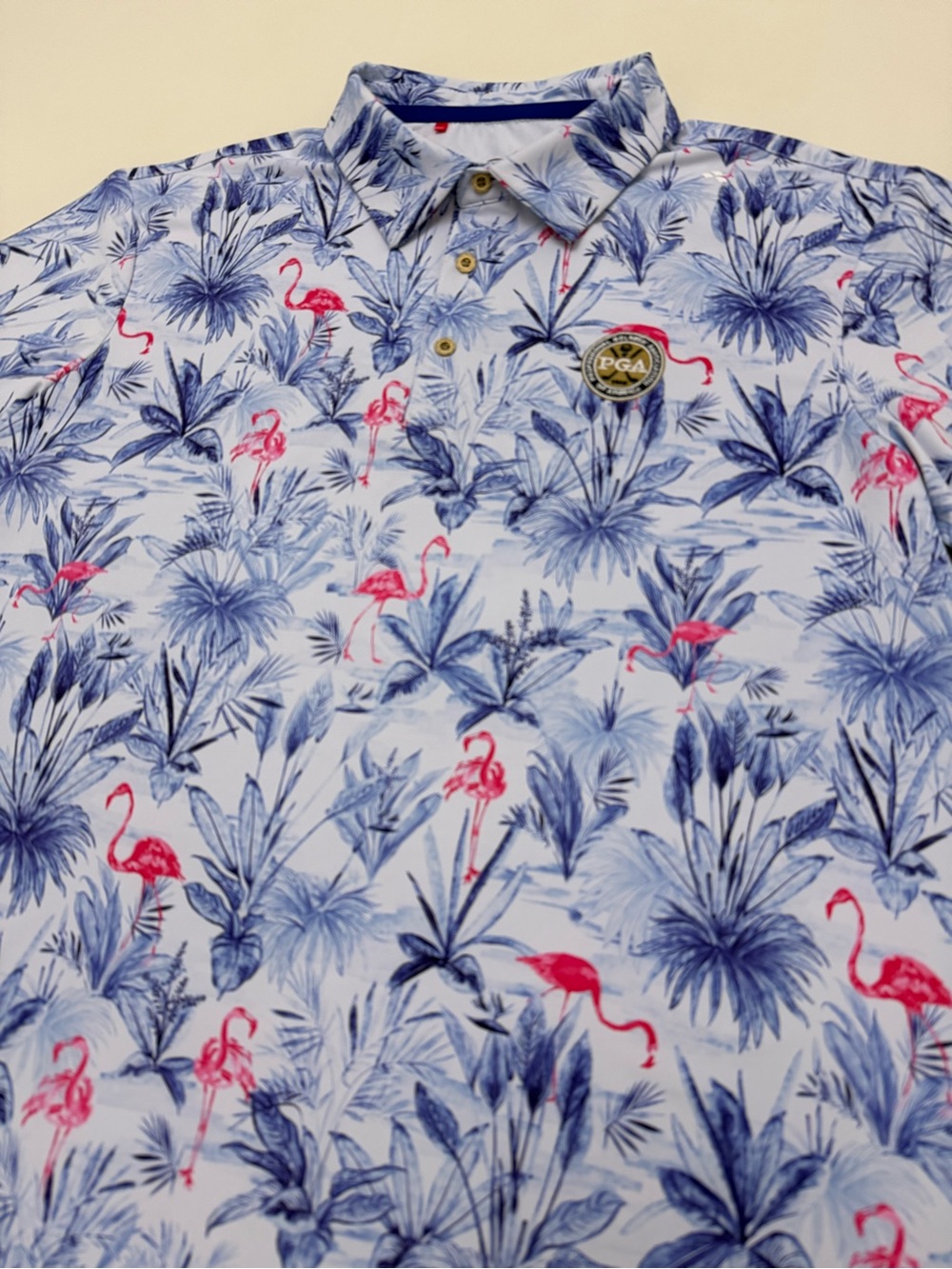 PGA Tour Scales Men's Blue Floral Polo with Pink Flamingo Print